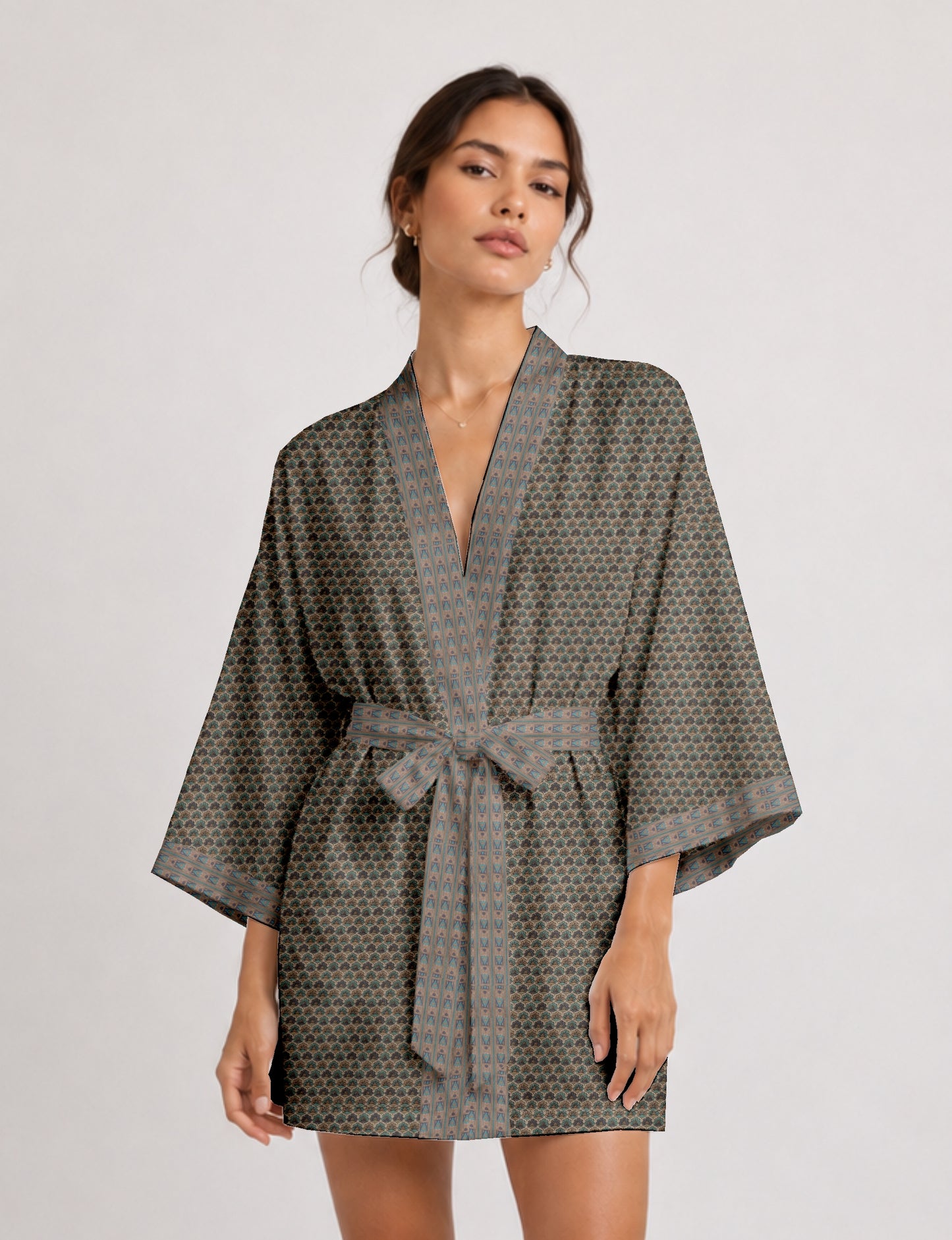 Short kimono robe with wrap front, V-neckline, wide sleeves, waist tie, and concealed skort detail.