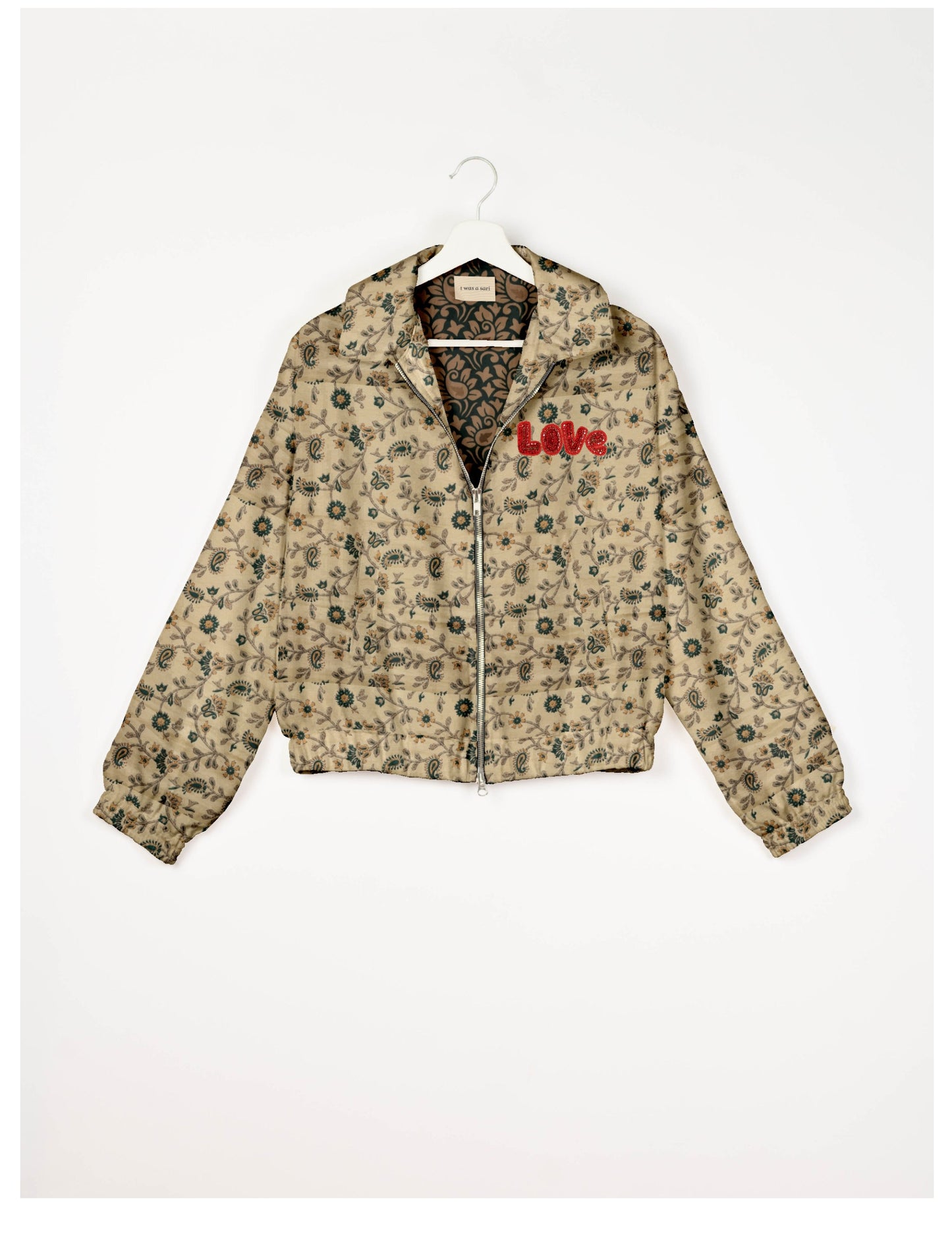 Love Bomber Jacket made from recycled fabric, featuring hand-stitched Aari embroidery. A unique piece of zero-waste clothing, part of the circular fashion movement. Designed with upcycled materials for a stylish yet environmentally friendly clothing choice.