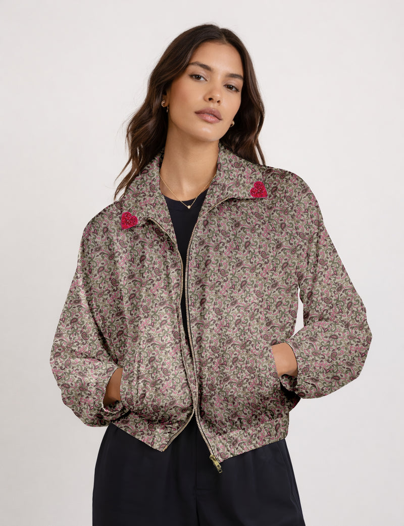 Love Bomber Jacket made from recycled fabric, featuring hand-stitched Aari embroidery. A unique piece of zero-waste clothing, part of the circular fashion movement. Designed with upcycled materials for a stylish yet environmentally friendly clothing choice.