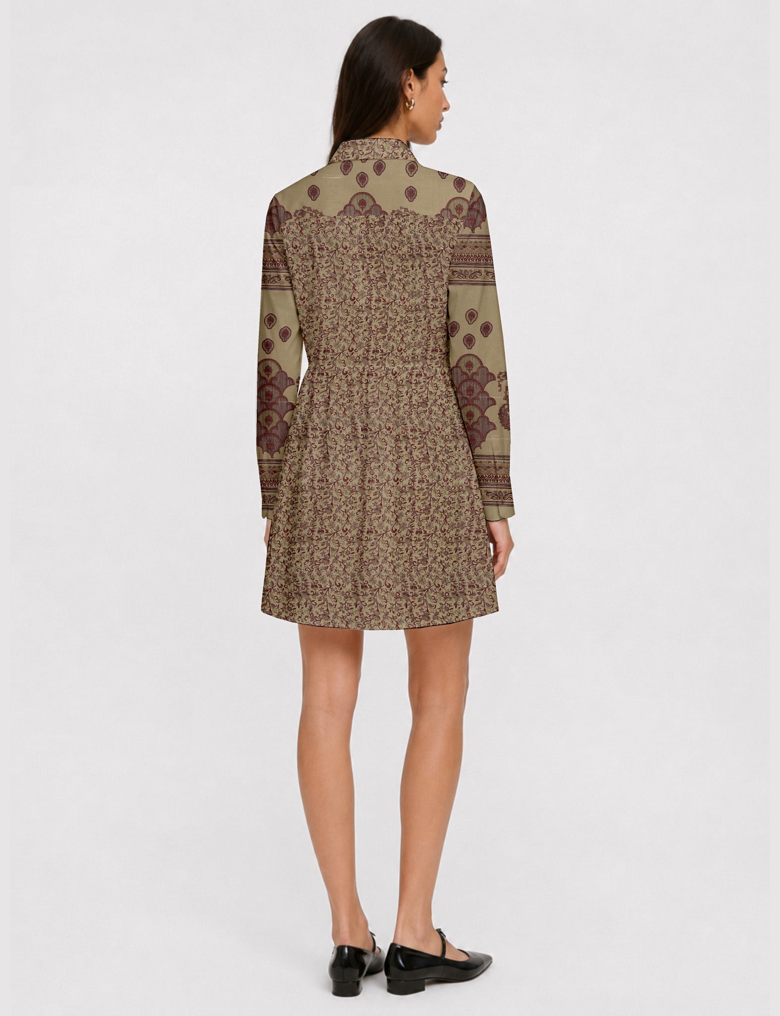 Short shirt dress with a relaxed A-line silhouette, point collar, partial button placket, gathered waist, side pockets, and full-length cuffed sleeves.