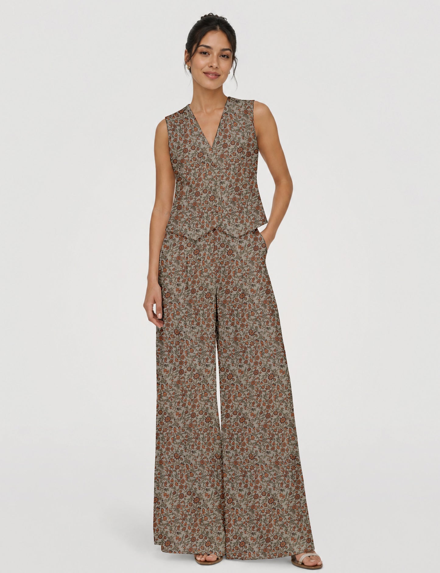 Women's tailored waistcoat set with a sleeveless V-neck button-front waistcoat and high-rise wide leg trousers in a coordinated matching outfit.