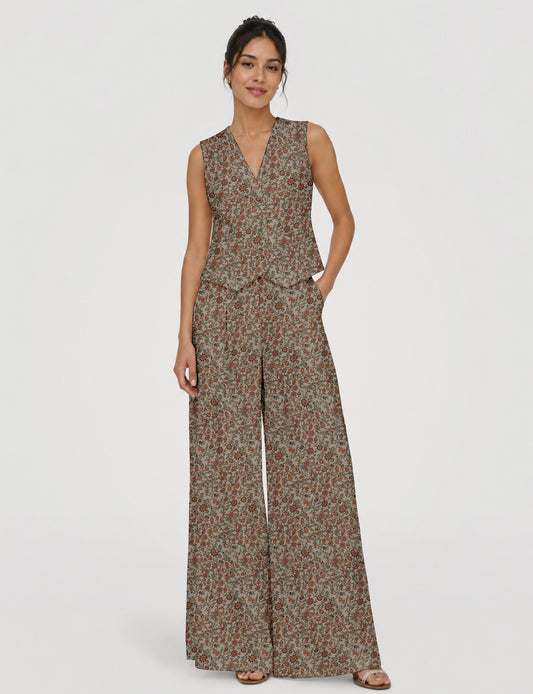 Women's tailored waistcoat set with a sleeveless V-neck button-front waistcoat and high-rise wide leg trousers in a coordinated matching outfit.