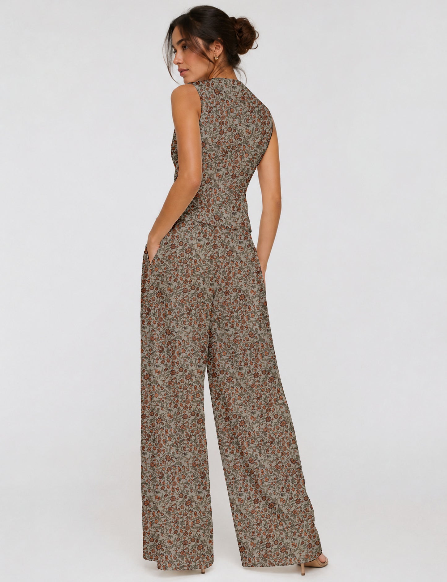 Women's tailored waistcoat set with a sleeveless V-neck button-front waistcoat and high-rise wide leg trousers in a coordinated matching outfit.