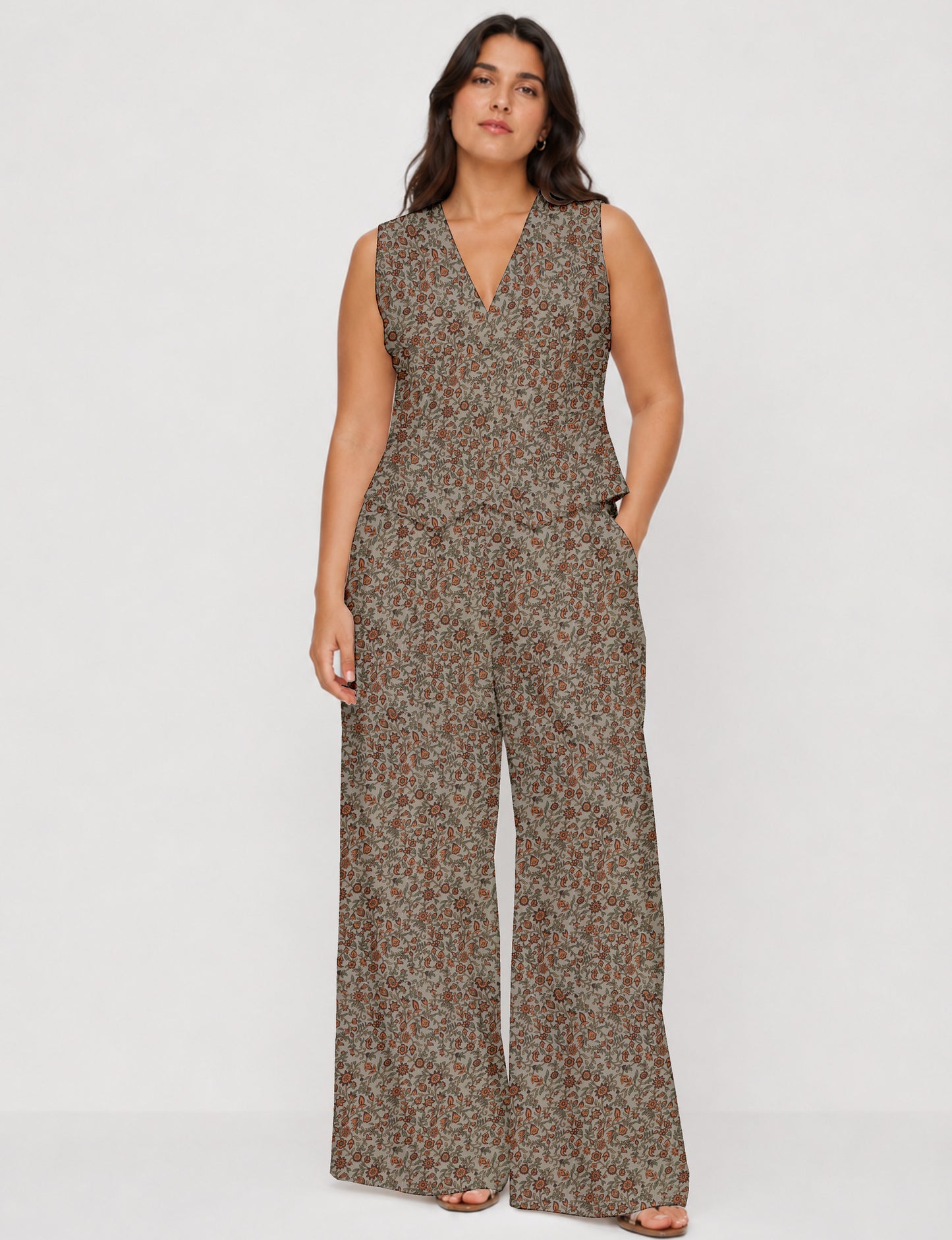 Women's tailored waistcoat set with a sleeveless V-neck button-front waistcoat and high-rise wide leg trousers in a coordinated matching outfit.