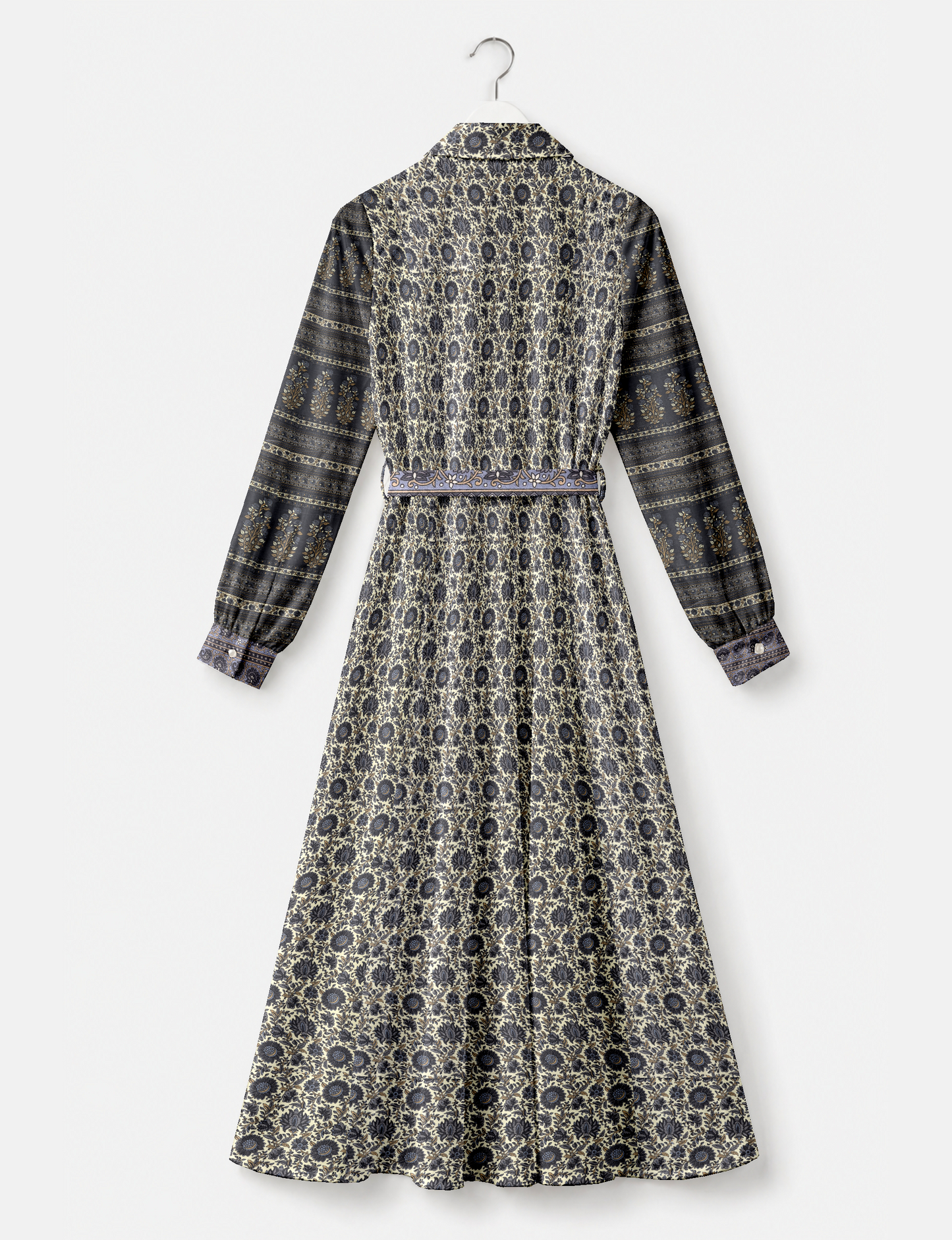 Beige long shirt dress with dark floral and striped tropical print, long sleeves, buttoned cuffs, and a matching belt, back