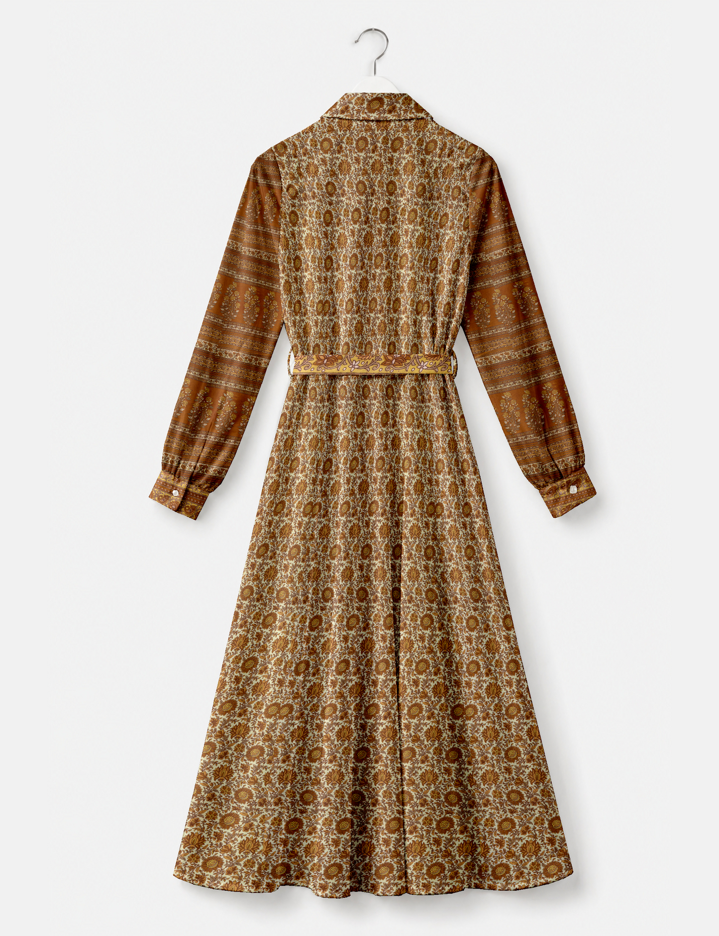 Beige long shirt dress with tropical floral print, contrasting brown patterned long sleeves, buttoned cuffs, and a matching