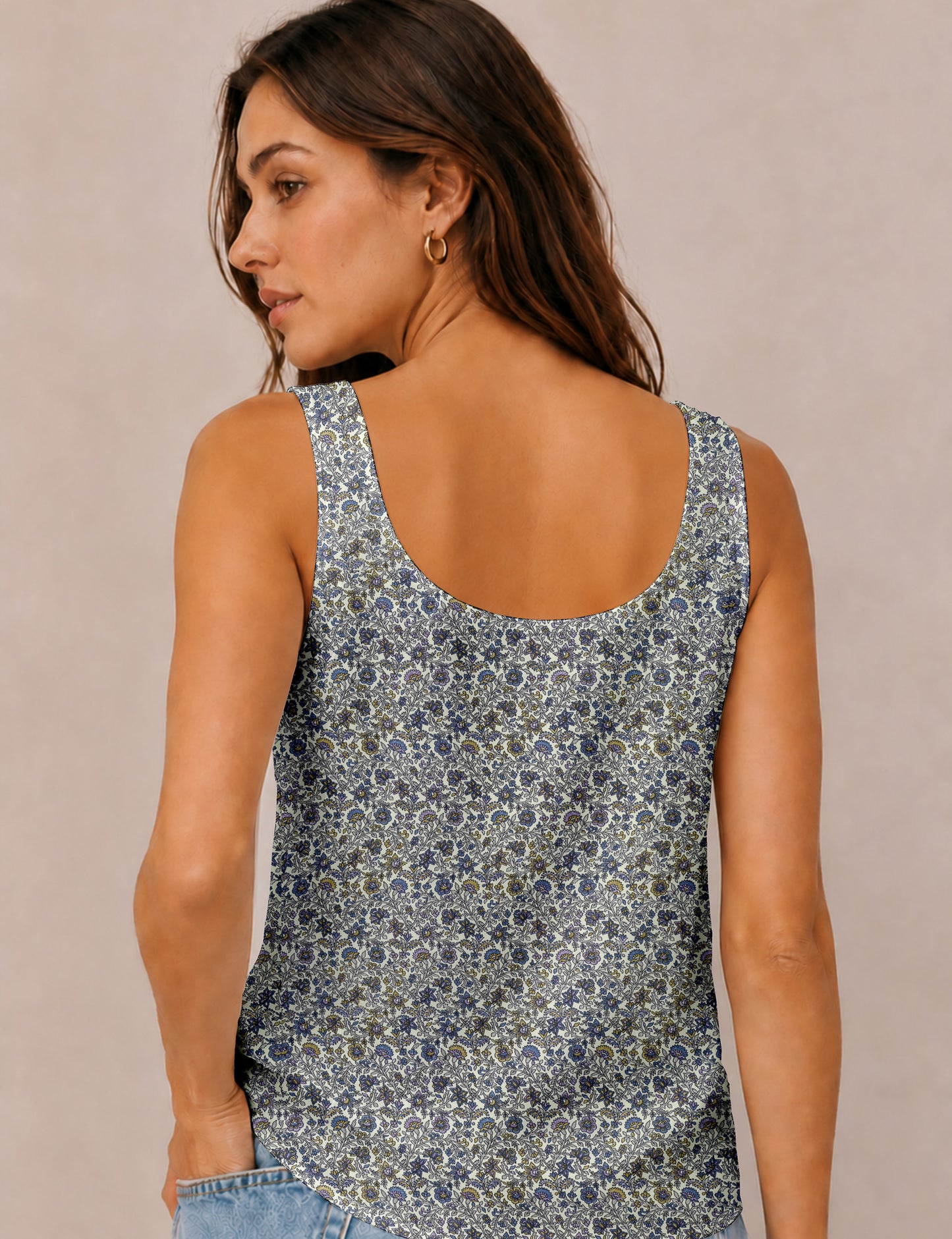 Women's sleeveless blouse with a relaxed straight fit, wide scoop neckline, deep scoop back, and hip-length silhouette.