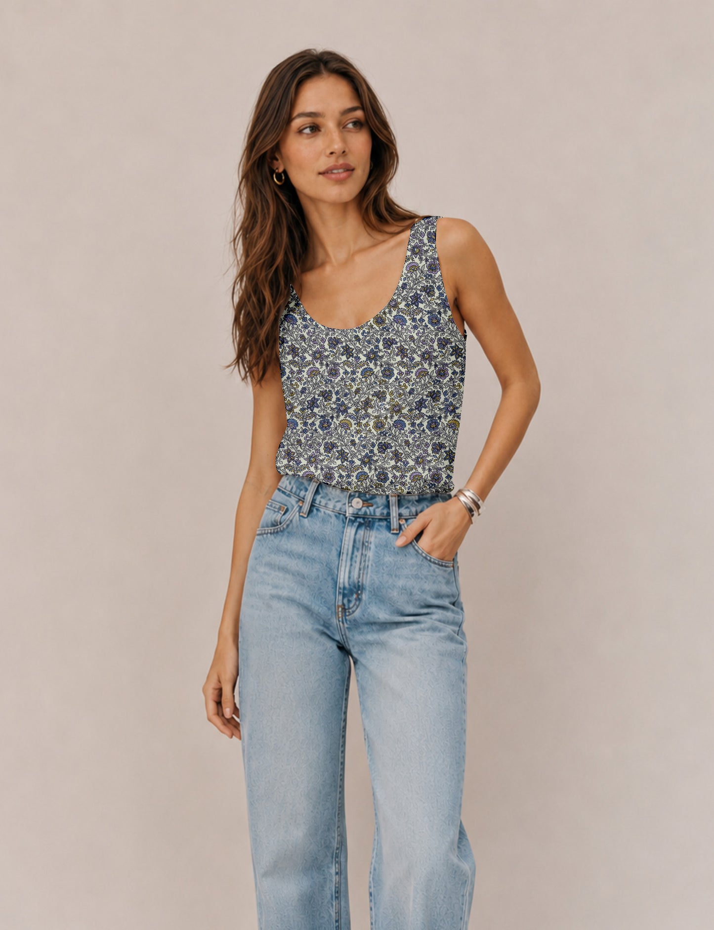 Women's sleeveless blouse with a relaxed straight fit, wide scoop neckline, deep scoop back, and hip-length silhouette.