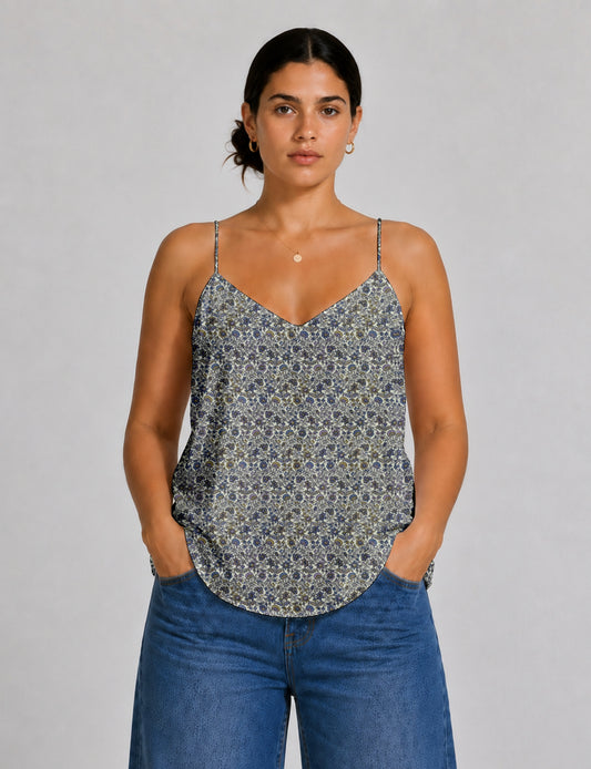 Women's sleeveless slip top with a relaxed straight fit, soft V-neckline, deep V-back, and delicate spaghetti straps.
