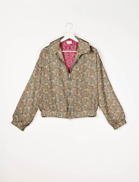Upcycled Bomber Jacket made from recycled sari materials, featuring a cute cropped shape, elasticated hem and cuffs, and contrast sari print lining. Sustainable apparel promoting eco-friendly fashion and ethical clothing.