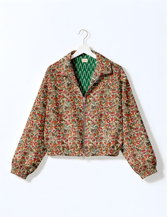 Upcycled Bomber Jacket made from recycled sari materials, featuring a cute cropped shape, elasticated hem and cuffs, and contrast sari print lining. Sustainable apparel promoting eco-friendly fashion and ethical clothing.