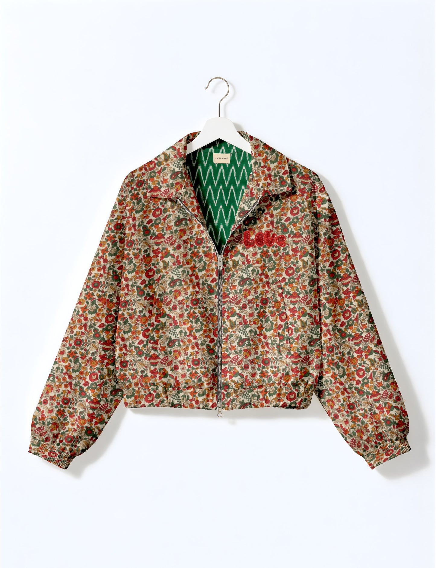 Love Bomber Jacket made from recycled fabric, featuring hand-stitched Aari embroidery. A unique piece of zero-waste clothing, part of the circular fashion movement. Designed with upcycled materials for a stylish yet environmentally friendly clothing choice.