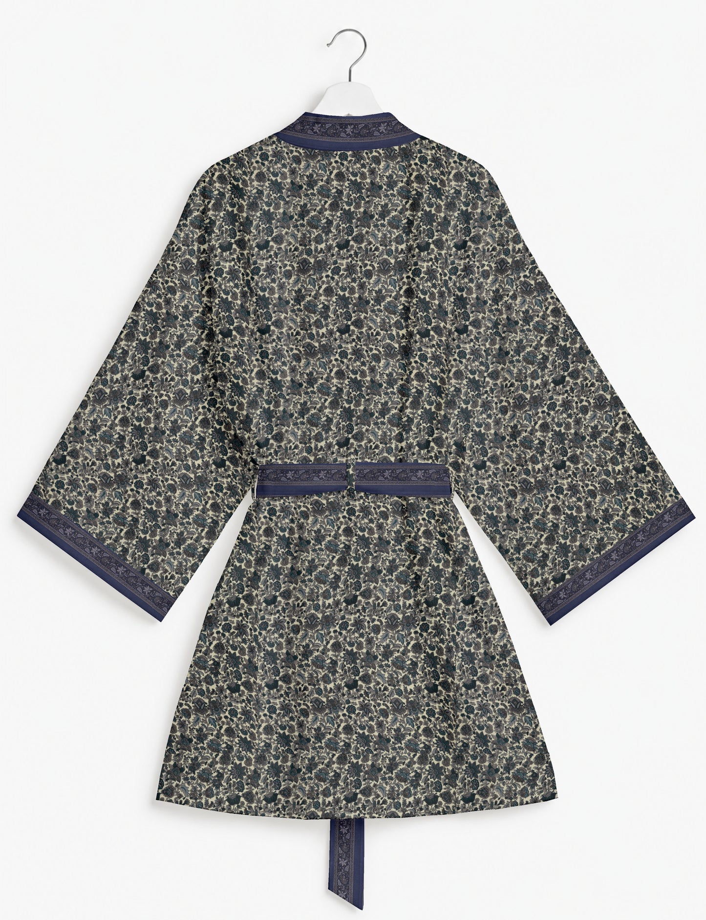 Short kimono robe with wrap front, V-neckline, wide sleeves, waist tie, and concealed skort detail.