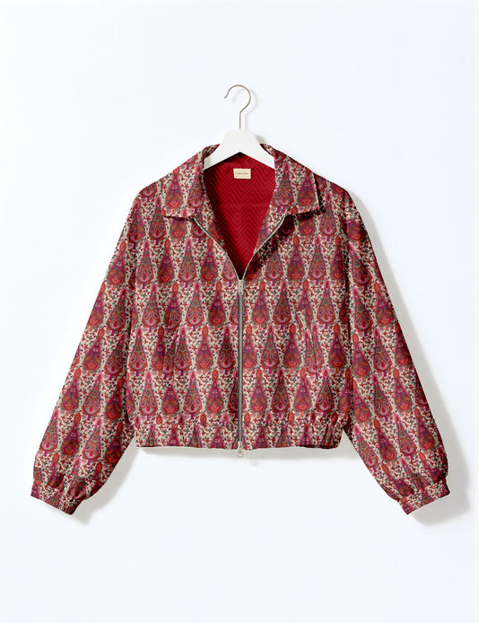 Upcycled Bomber Jacket made from recycled sari materials, featuring a cute cropped shape, elasticated hem and cuffs, and contrast sari print lining. Sustainable apparel promoting eco-friendly fashion and ethical clothing.