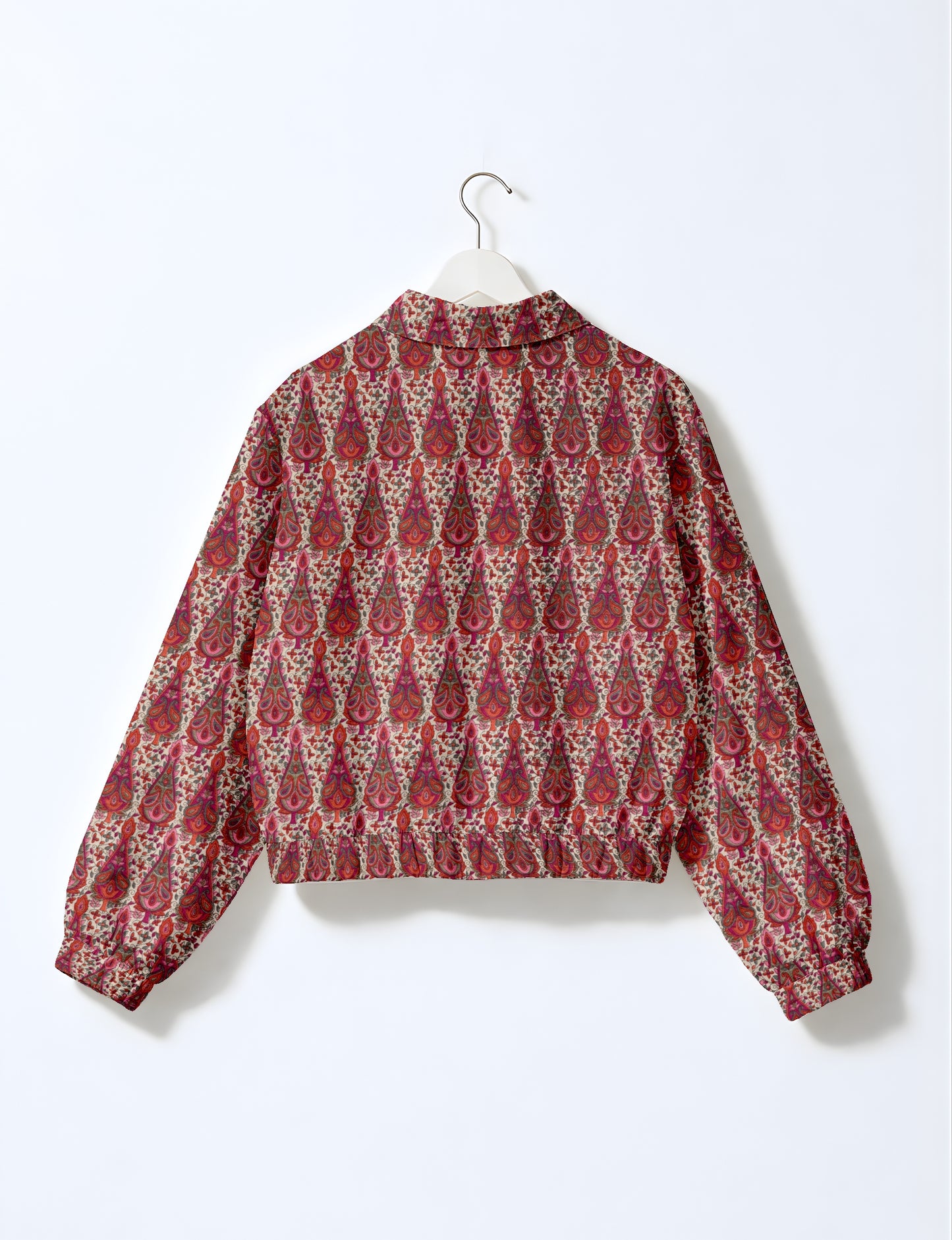 Upcycled Bomber Jacket made from recycled sari materials, featuring a cute cropped shape, elasticated hem and cuffs, and contrast sari print lining. Sustainable apparel promoting eco-friendly fashion and ethical clothing.