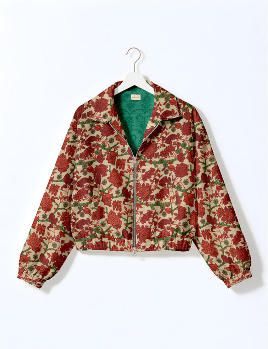 Upcycled Bomber Jacket made from recycled sari materials, featuring a cute cropped shape, elasticated hem and cuffs, and contrast sari print lining. Sustainable apparel promoting eco-friendly fashion and ethical clothing.