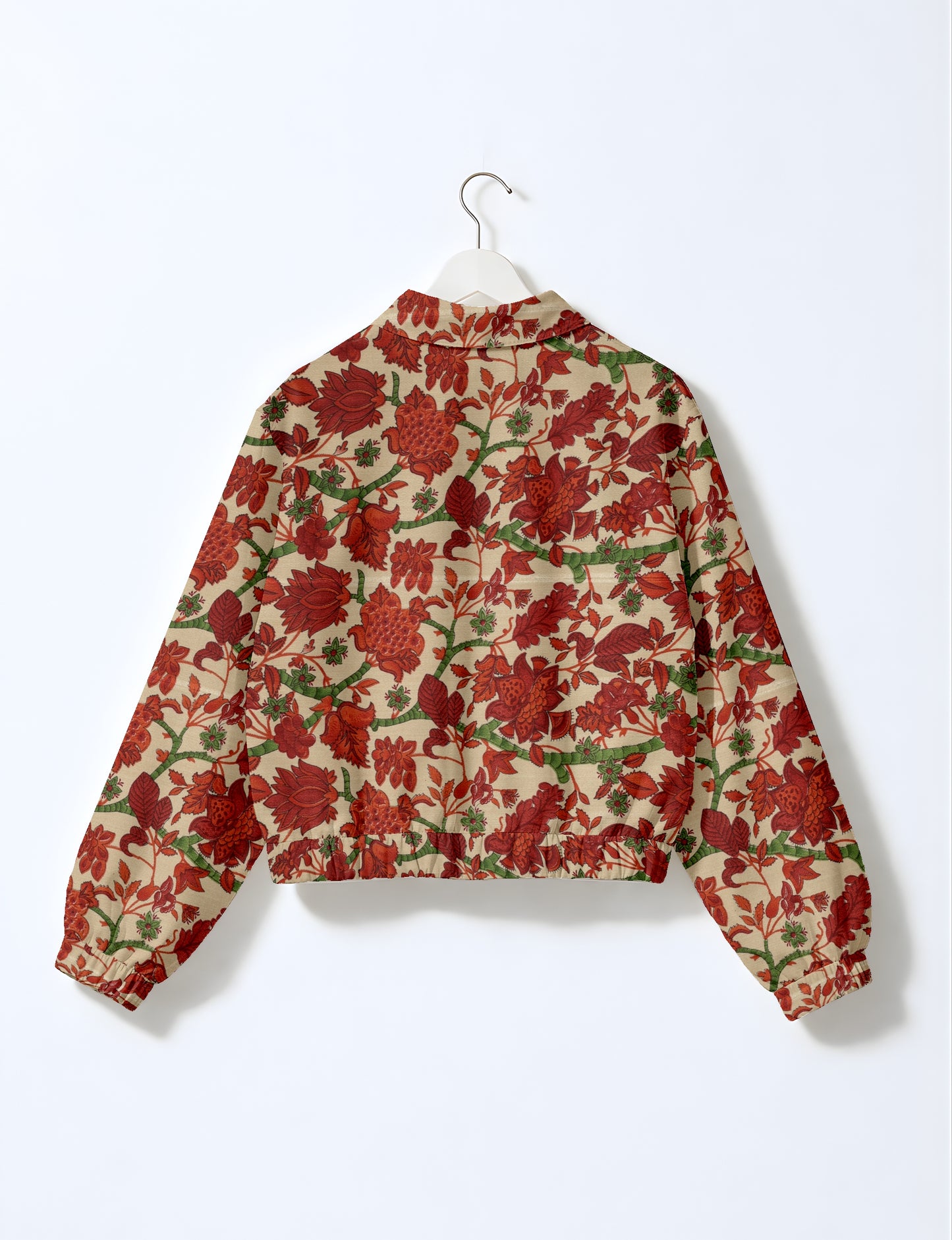 Upcycled Bomber Jacket made from recycled sari materials, featuring a cute cropped shape, elasticated hem and cuffs, and contrast sari print lining. Sustainable apparel promoting eco-friendly fashion and ethical clothing.