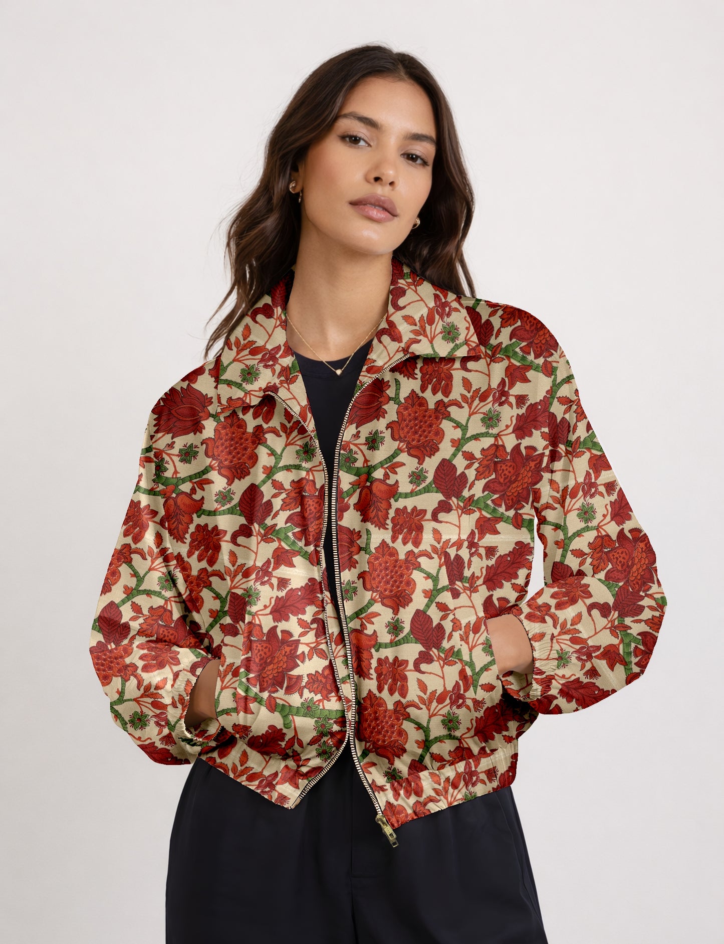 Upcycled Bomber Jacket made from recycled sari materials, featuring a cute cropped shape, elasticated hem and cuffs, and contrast sari print lining. Sustainable apparel promoting eco-friendly fashion and ethical clothing.