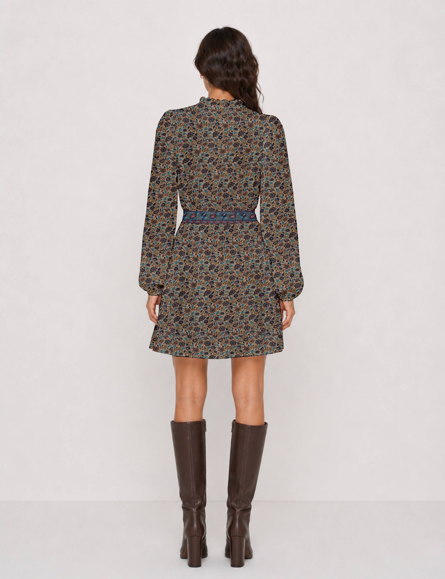 Swing dress with detachable tie belt, gathered ruffle neckline, full-length voluminous sleeves, elastic cuffs, and relaxed A-line silhouette in an above-knee length.