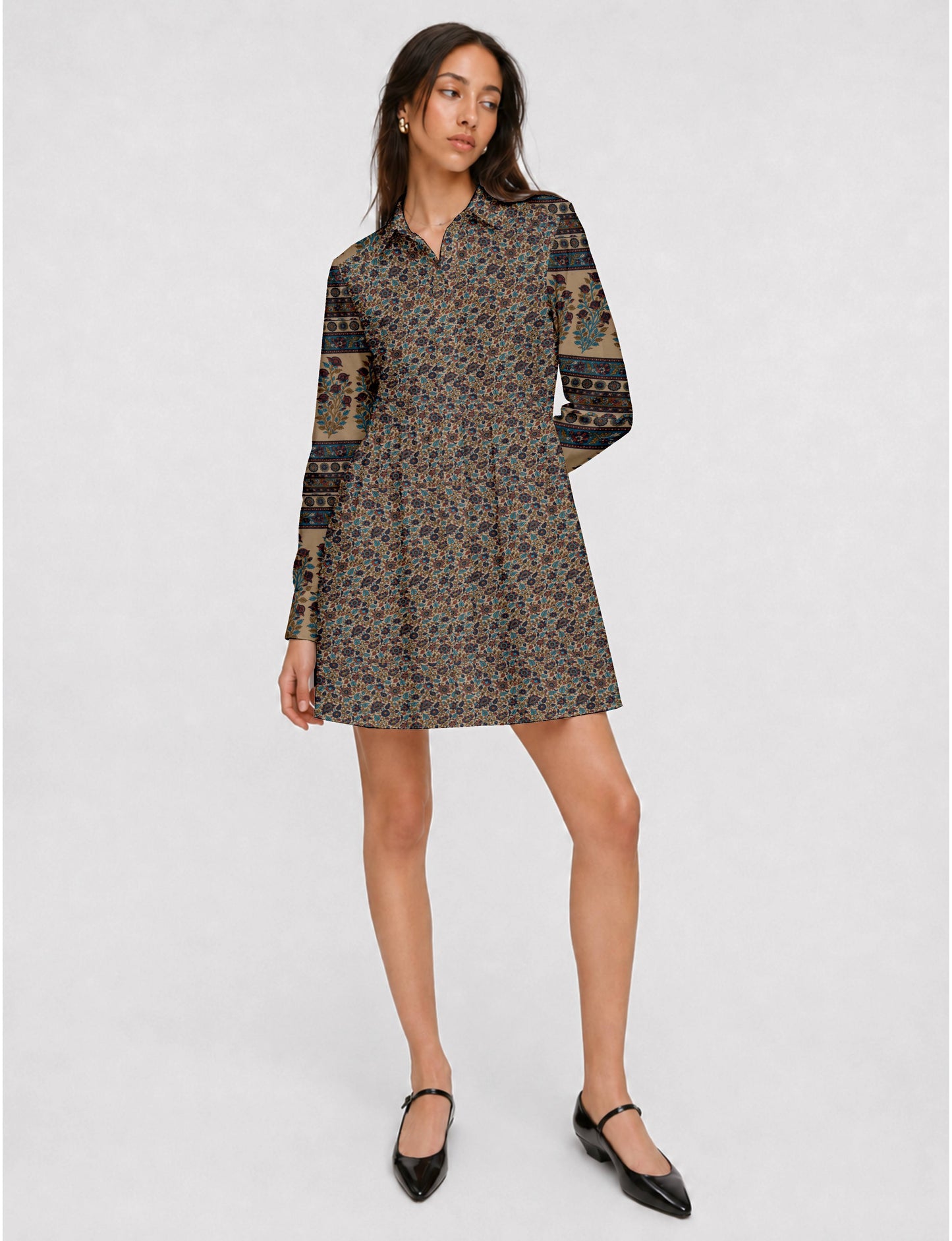 Short shirt dress with a relaxed A-line silhouette, point collar, partial button placket, gathered waist, side pockets, and full-length cuffed sleeves.