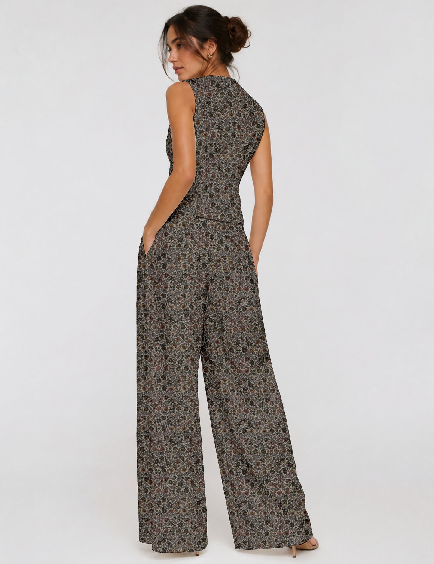 Women's tailored waistcoat set with a sleeveless V-neck button-front waistcoat and high-rise wide leg trousers in a coordinated matching outfit.