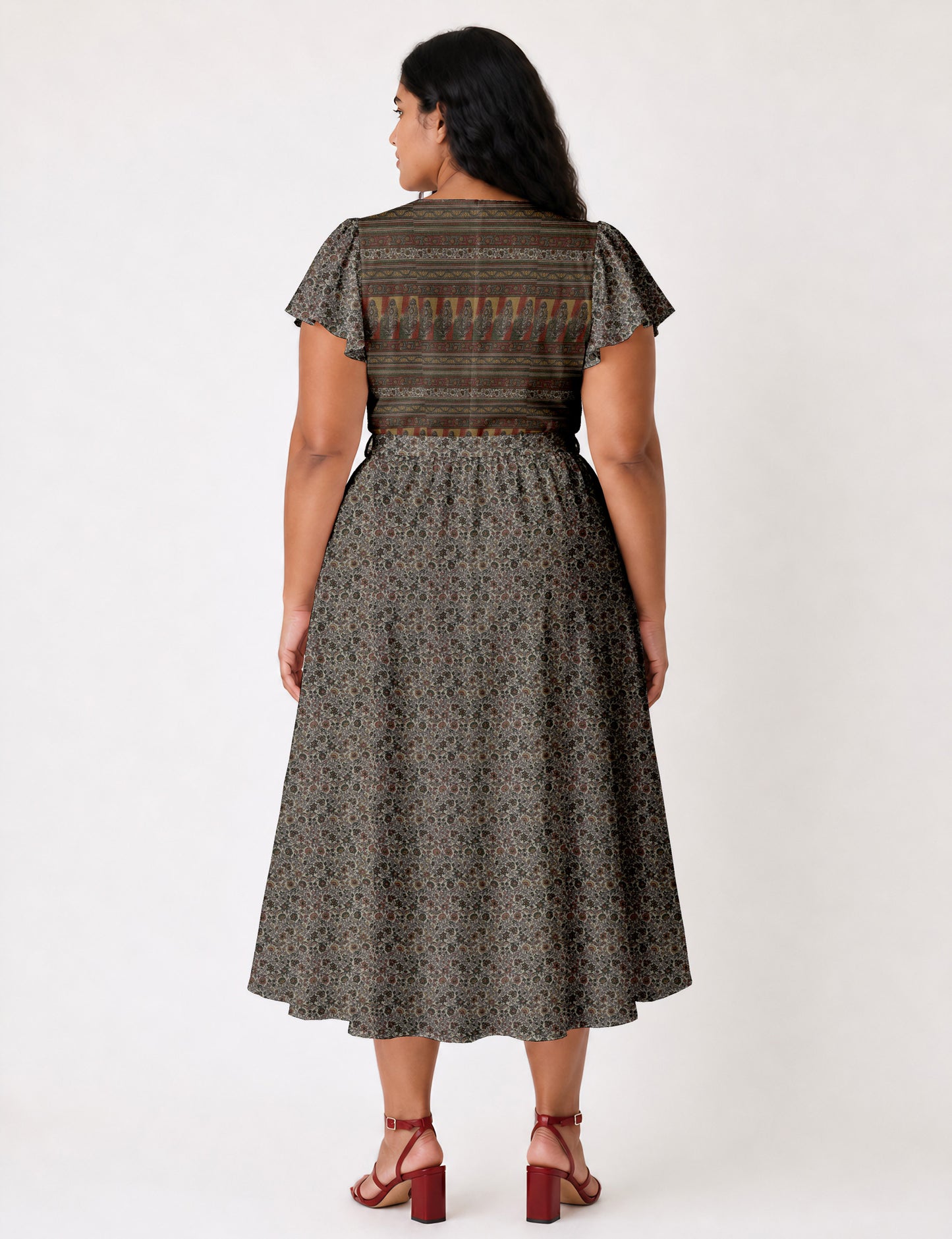 Elegant midi wrap dress with a V-neckline, adjustable waist tie, fitted bodice, and flared skirt for a timeless, flattering silhouette.