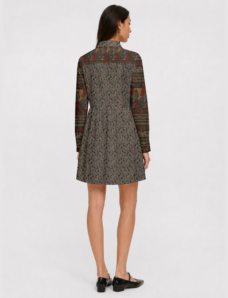 Short shirt dress with a relaxed A-line silhouette, point collar, partial button placket, gathered waist, side pockets, and full-length cuffed sleeves.