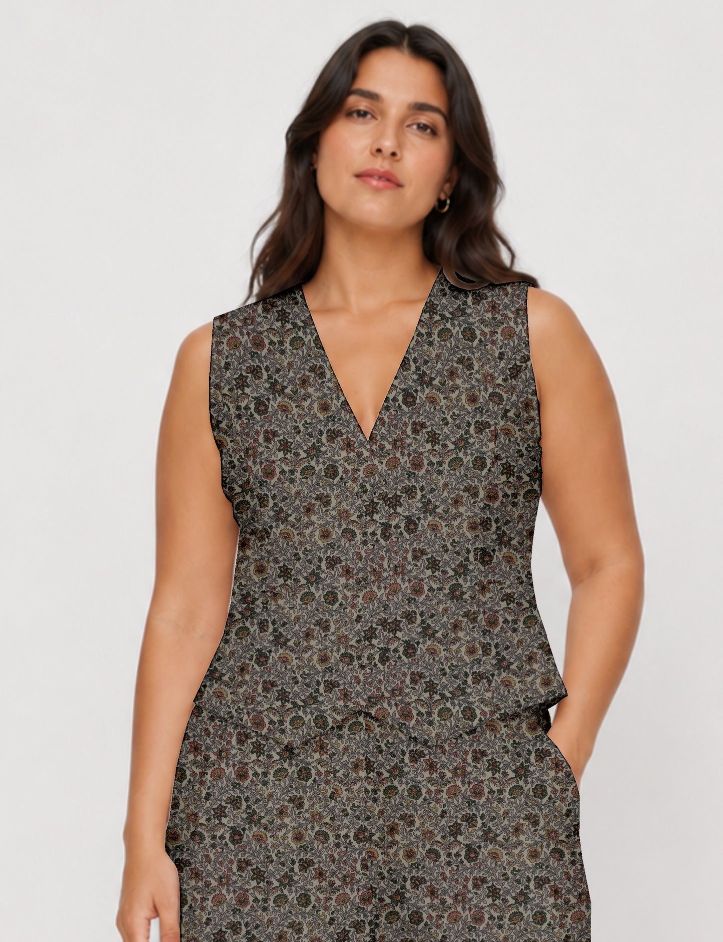 Women's fitted waistcoat with V-neck, single-breasted button closure, tailored silhouette, and pointed hem in sustainable fashion.
