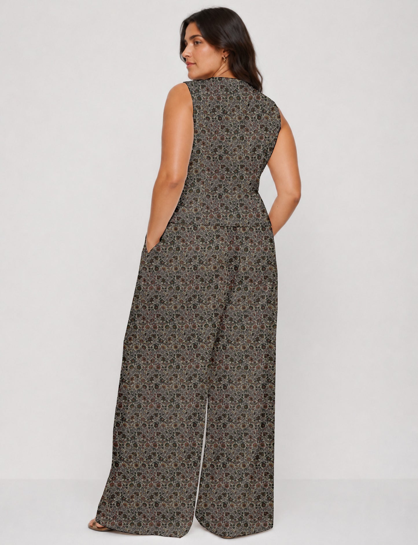 Women's tailored waistcoat set with a sleeveless V-neck button-front waistcoat and high-rise wide leg trousers in a coordinated matching outfit.