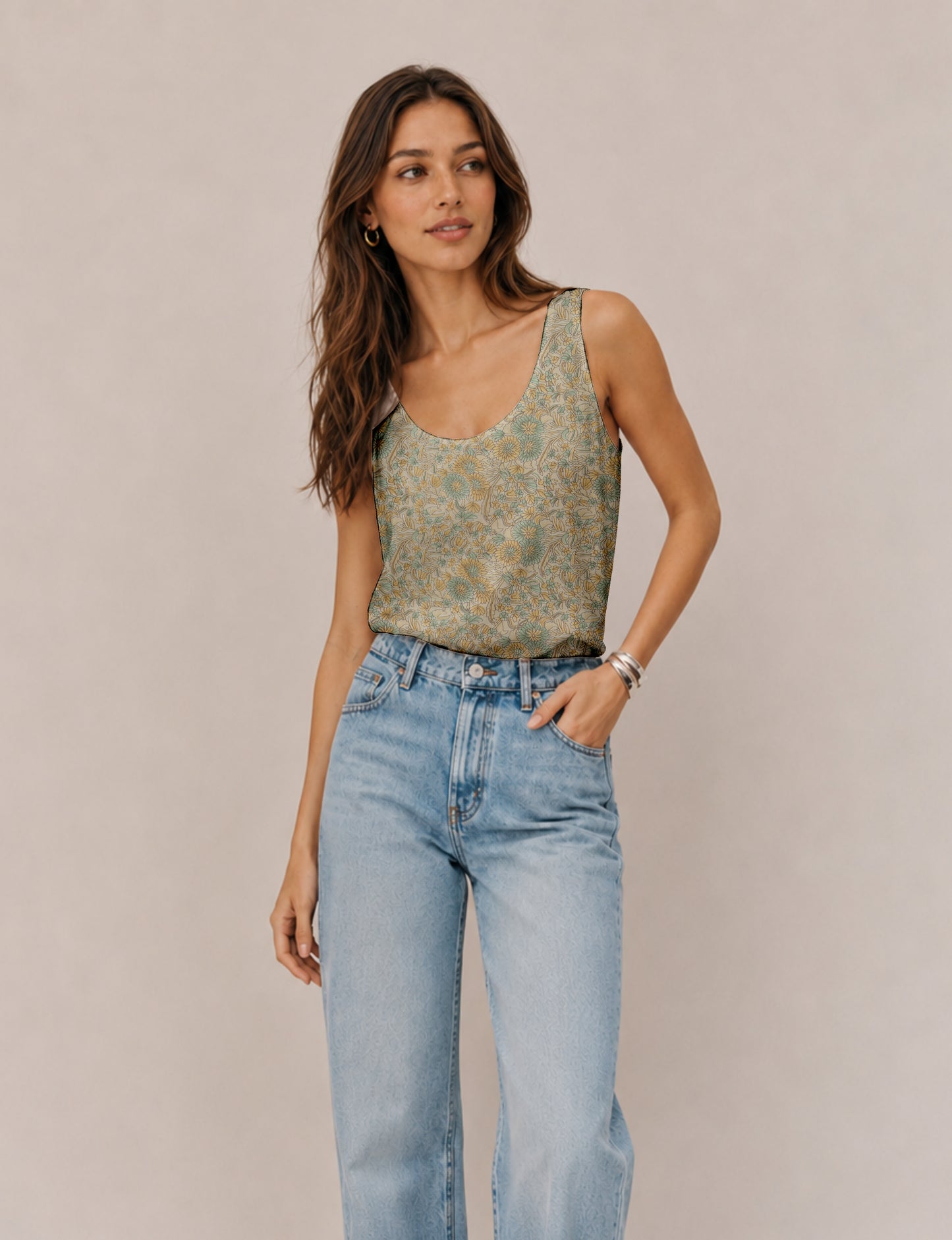 Women's sleeveless blouse with a relaxed straight fit, wide scoop neckline, deep scoop back, and hip-length silhouette.