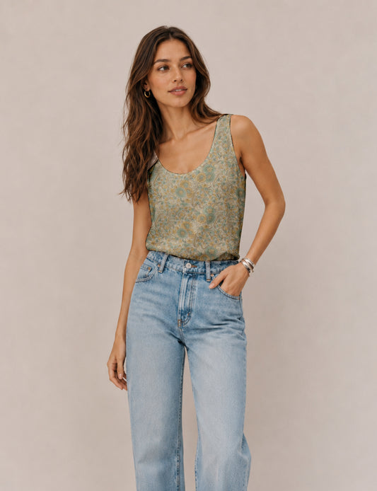 Women's sleeveless blouse with a relaxed straight fit, wide scoop neckline, deep scoop back, and hip-length silhouette.