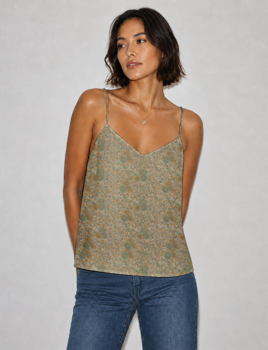 Women's sleeveless slip top with a relaxed straight fit, soft V-neckline, deep V-back, and delicate spaghetti straps.