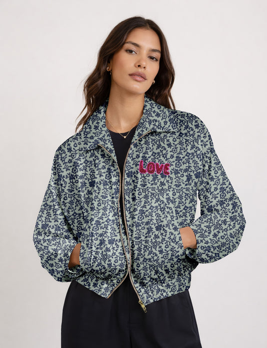 Love Bomber Jacket made from recycled fabric, featuring hand-stitched Aari embroidery. A unique piece of zero-waste clothing, part of the circular fashion movement. Designed with upcycled materials for a stylish yet environmentally friendly clothing choice.