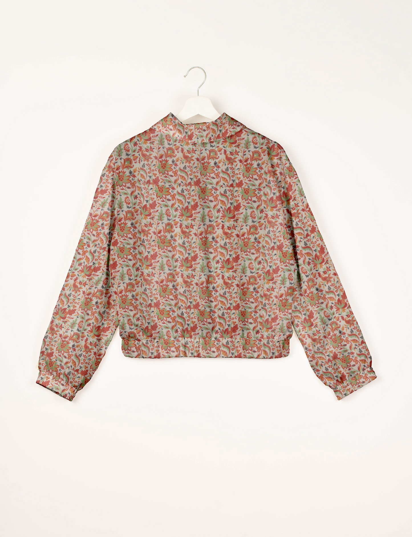 Upcycled Bomber Jacket made from recycled sari materials, featuring a cute cropped shape, elasticated hem and cuffs, and contrast sari print lining. Sustainable apparel promoting eco-friendly fashion and ethical clothing.