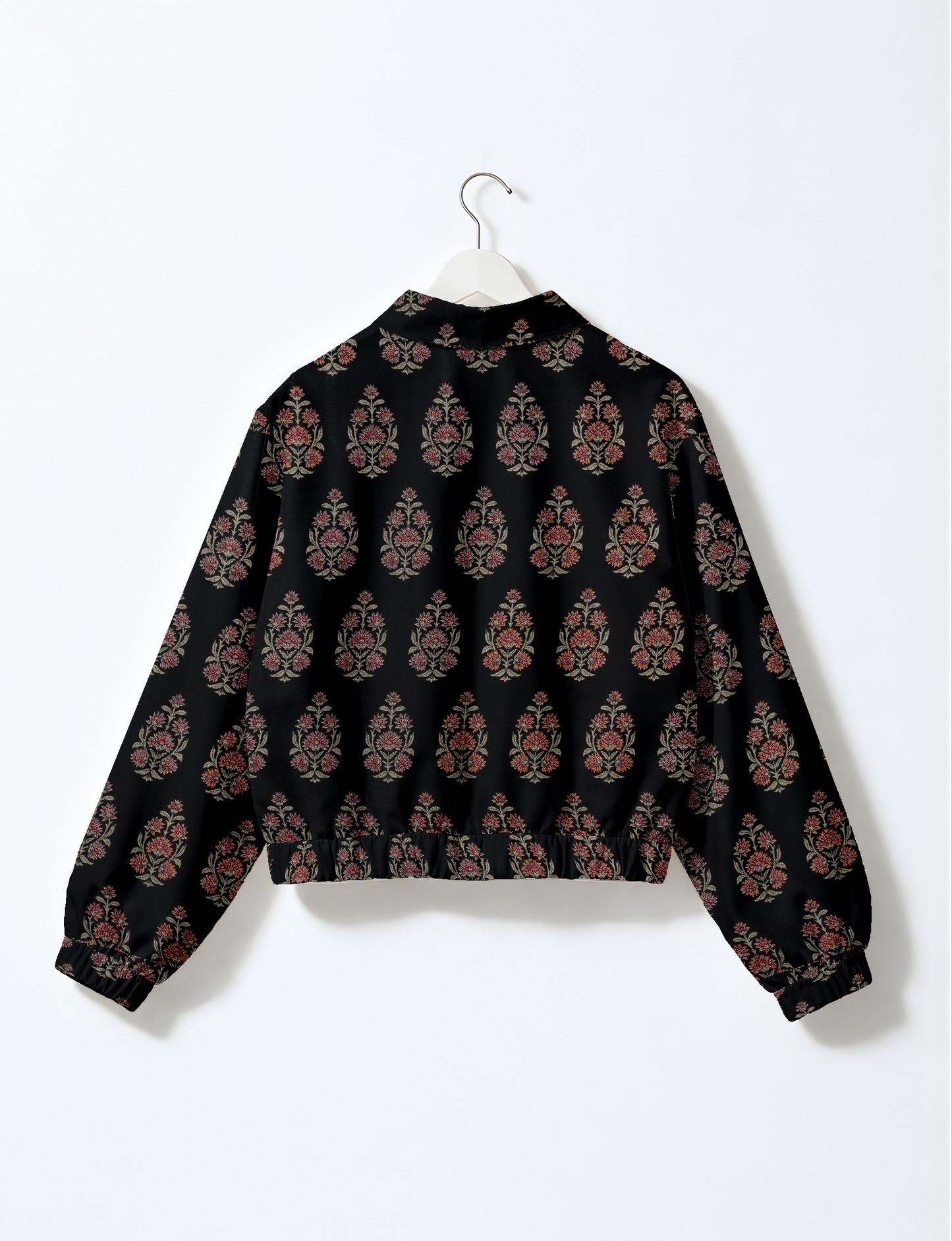 Upcycled Bomber Jacket made from recycled sari materials, featuring a cute cropped shape, elasticated hem and cuffs, and contrast sari print lining. Sustainable apparel promoting eco-friendly fashion and ethical clothing.