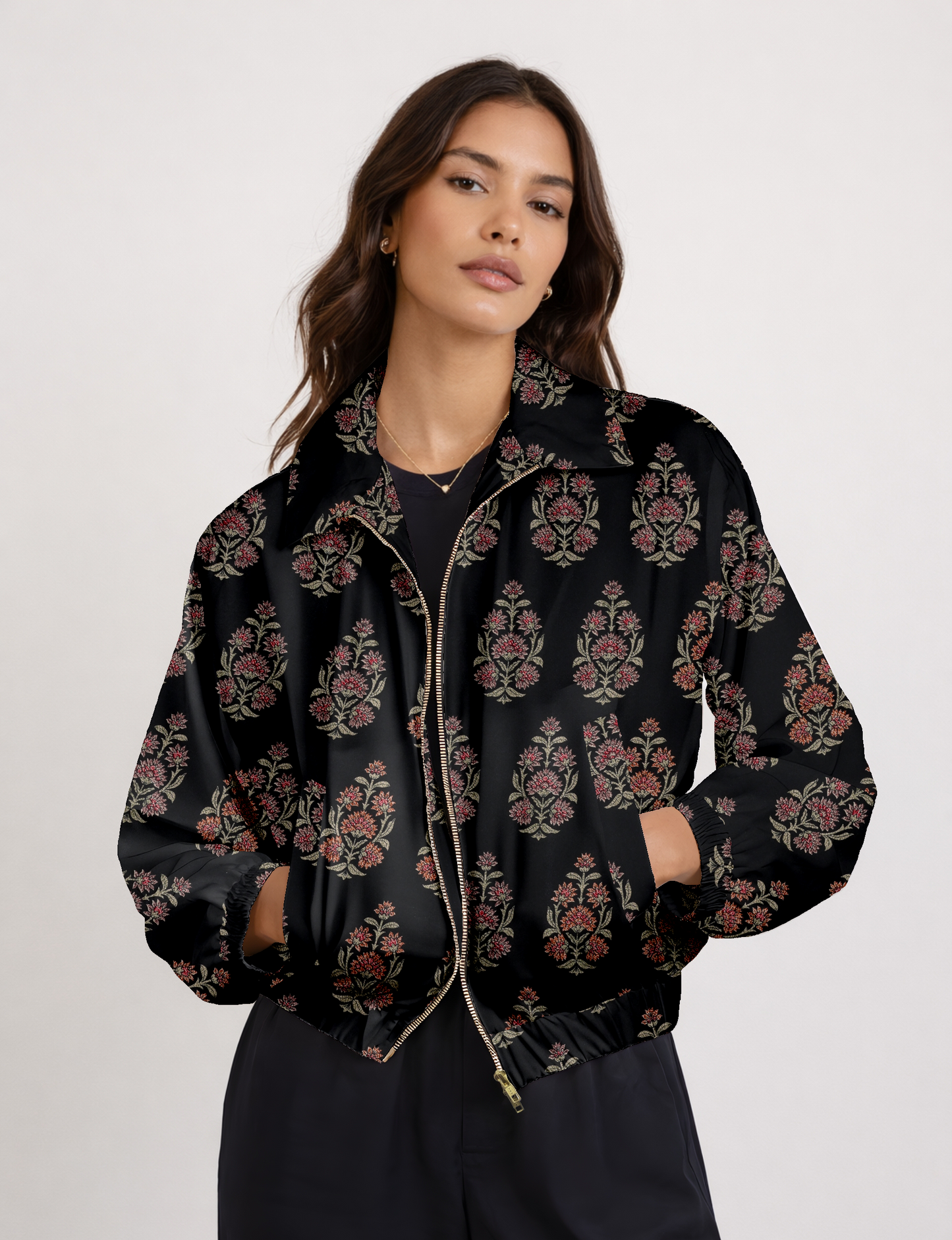 Upcycled Bomber Jacket made from recycled sari materials, featuring a cute cropped shape, elasticated hem and cuffs, and contrast sari print lining. Sustainable apparel promoting eco-friendly fashion and ethical clothing.