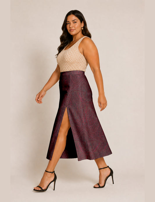 Midi A-line skirt with front slit, fitted waistband, concealed side closure, and below mid-calf length silhouette.
