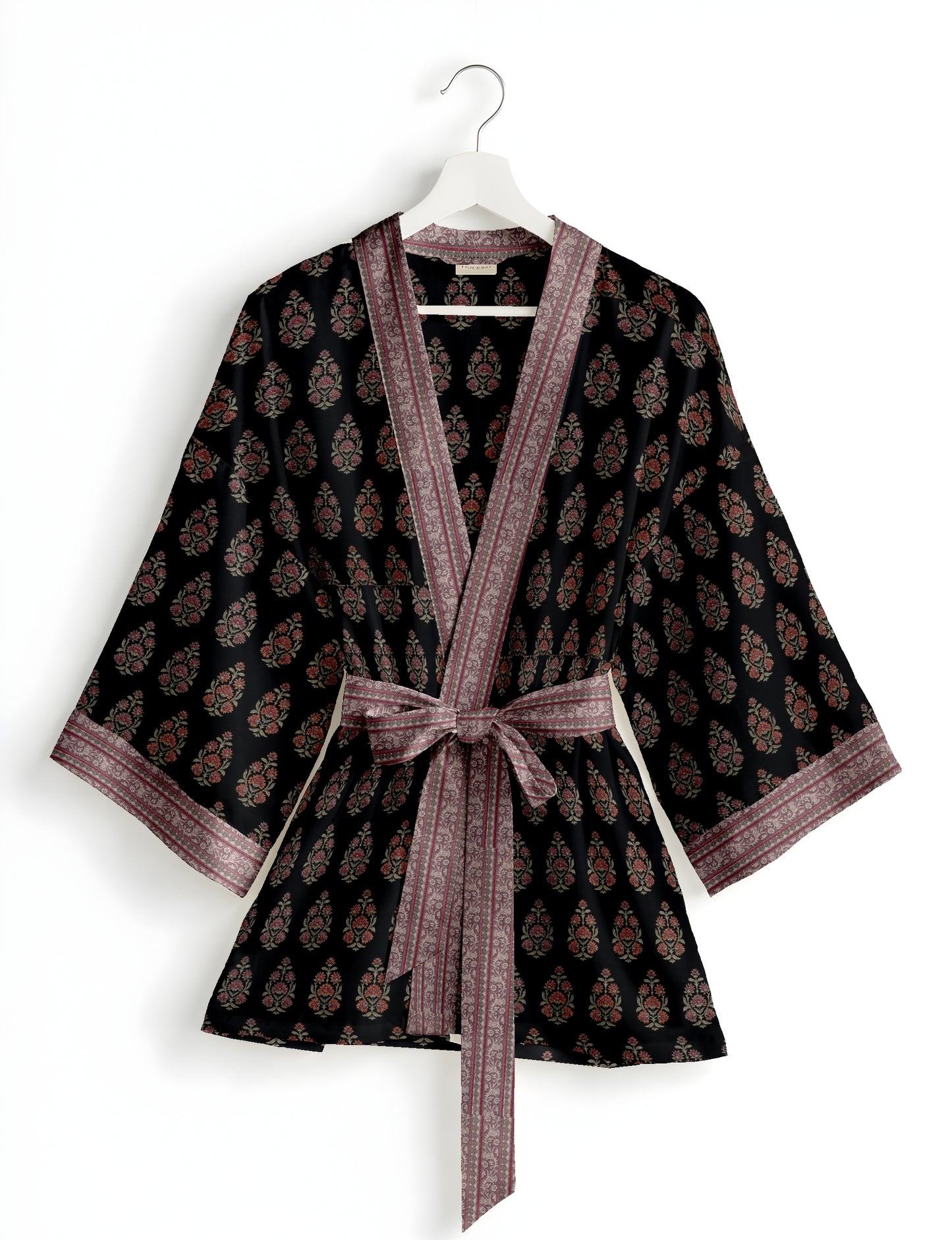 Short kimono robe with wrap front, V-neckline, wide sleeves, waist tie, and concealed skort detail.