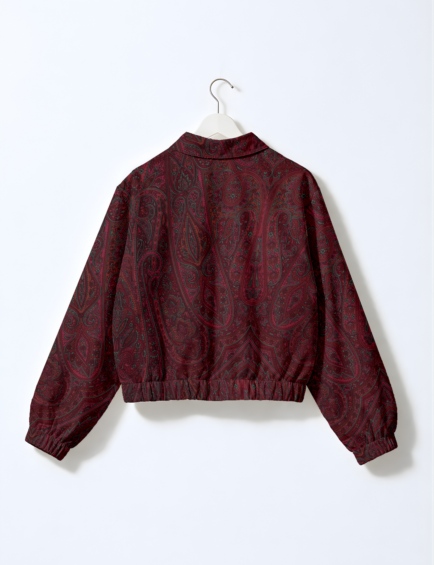Upcycled Bomber Jacket made from recycled sari materials, featuring a cute cropped shape, elasticated hem and cuffs, and contrast sari print lining. Sustainable apparel promoting eco-friendly fashion and ethical clothing.