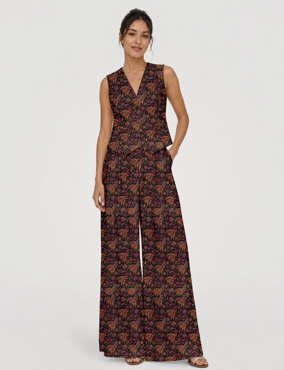 Women's tailored waistcoat set with a sleeveless V-neck button-front waistcoat and high-rise wide leg trousers in a coordinated matching outfit.