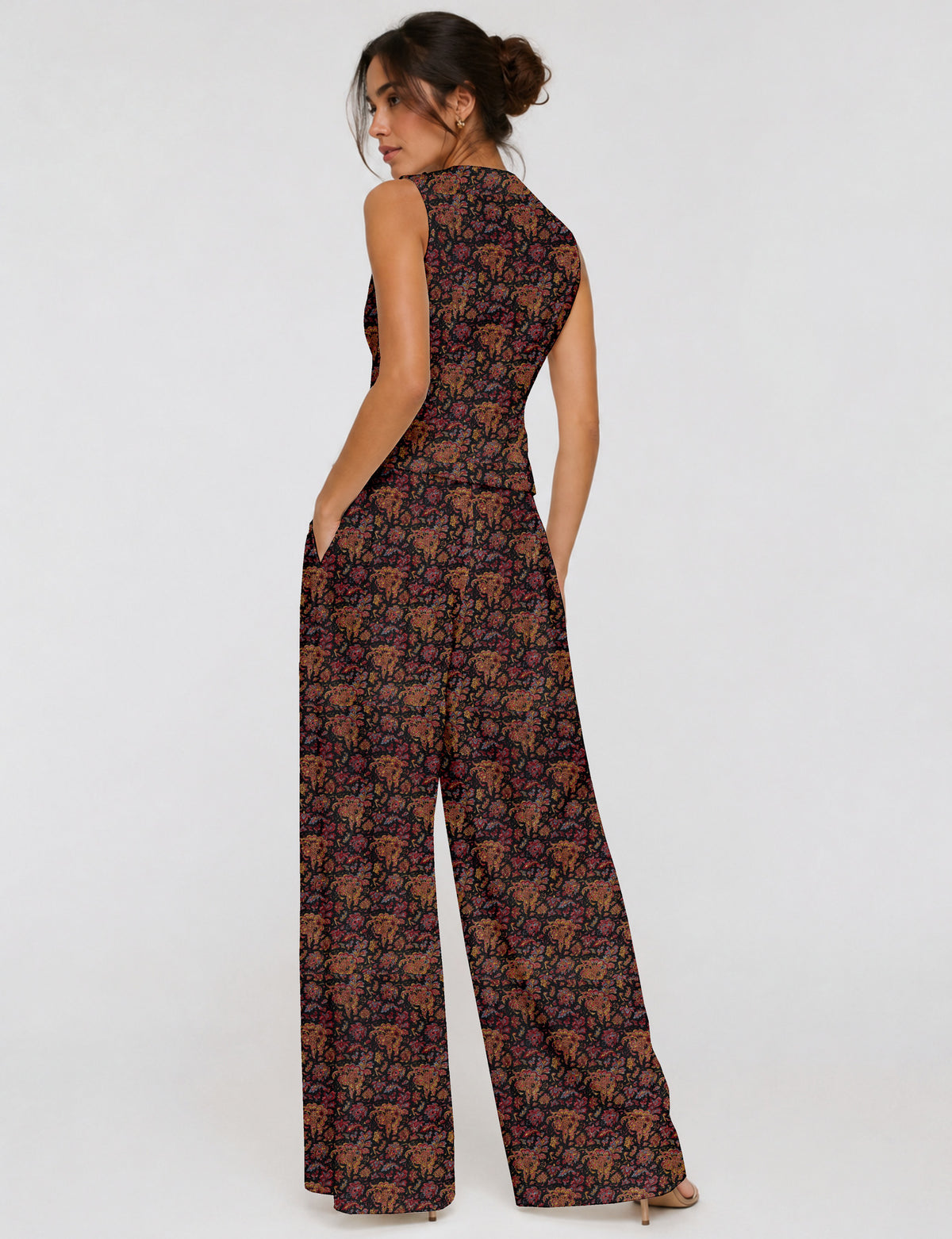 Women's tailored waistcoat set with a sleeveless V-neck button-front waistcoat and high-rise wide leg trousers in a coordinated matching outfit.