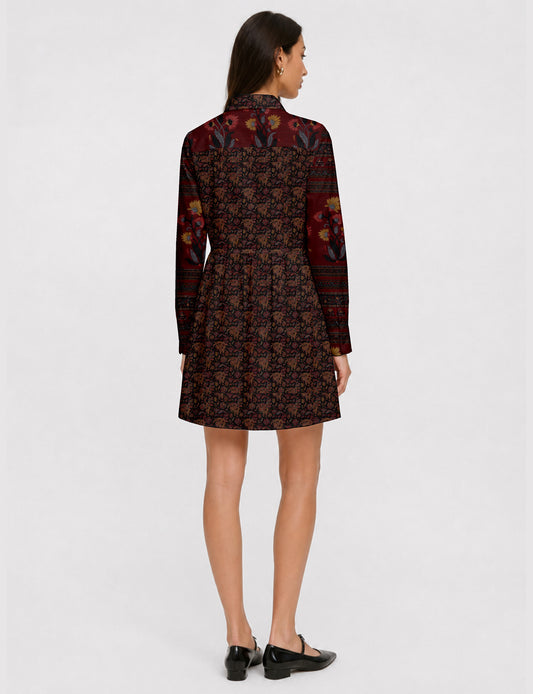 Short shirt dress with a relaxed A-line silhouette, point collar, partial button placket, gathered waist, side pockets, and full-length cuffed sleeves.