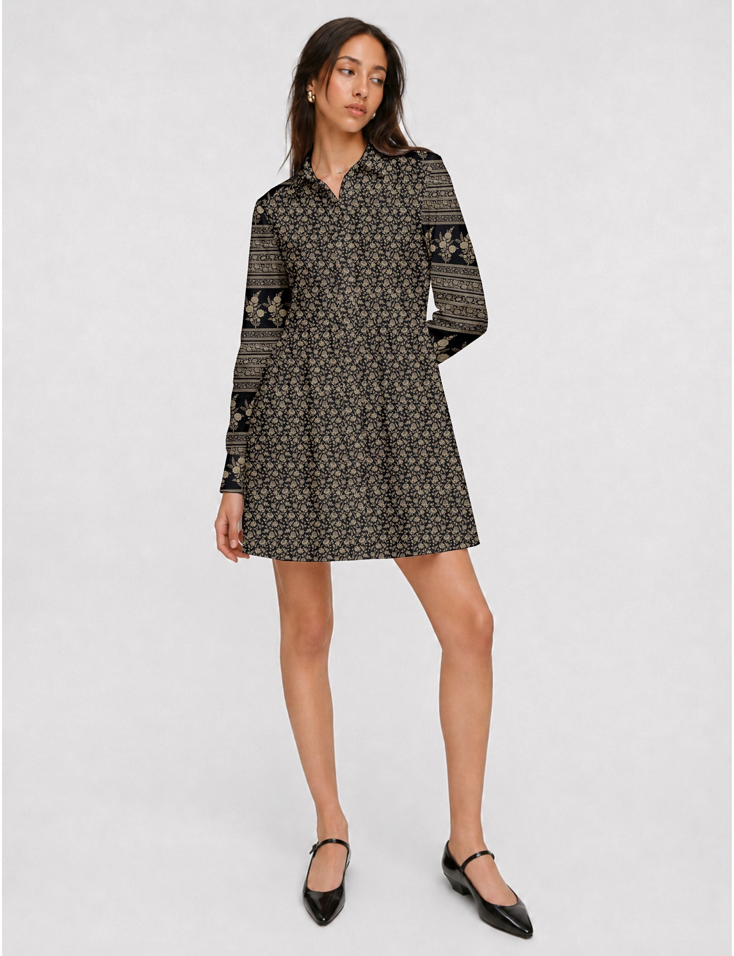 Short shirt dress with a relaxed A-line silhouette, point collar, partial button placket, gathered waist, side pockets, and full-length cuffed sleeves.