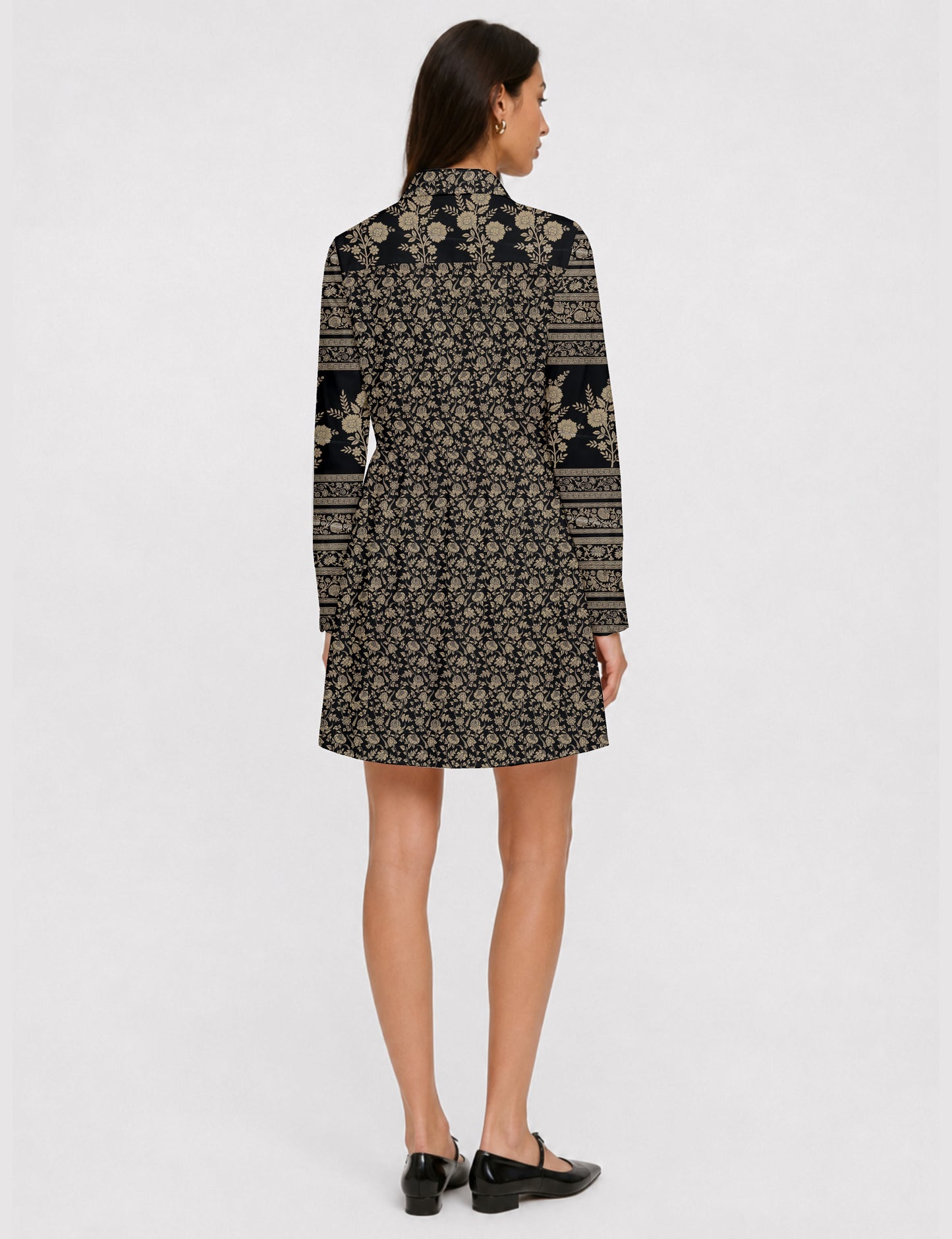 Short shirt dress with a relaxed A-line silhouette, point collar, partial button placket, gathered waist, side pockets, and full-length cuffed sleeves.