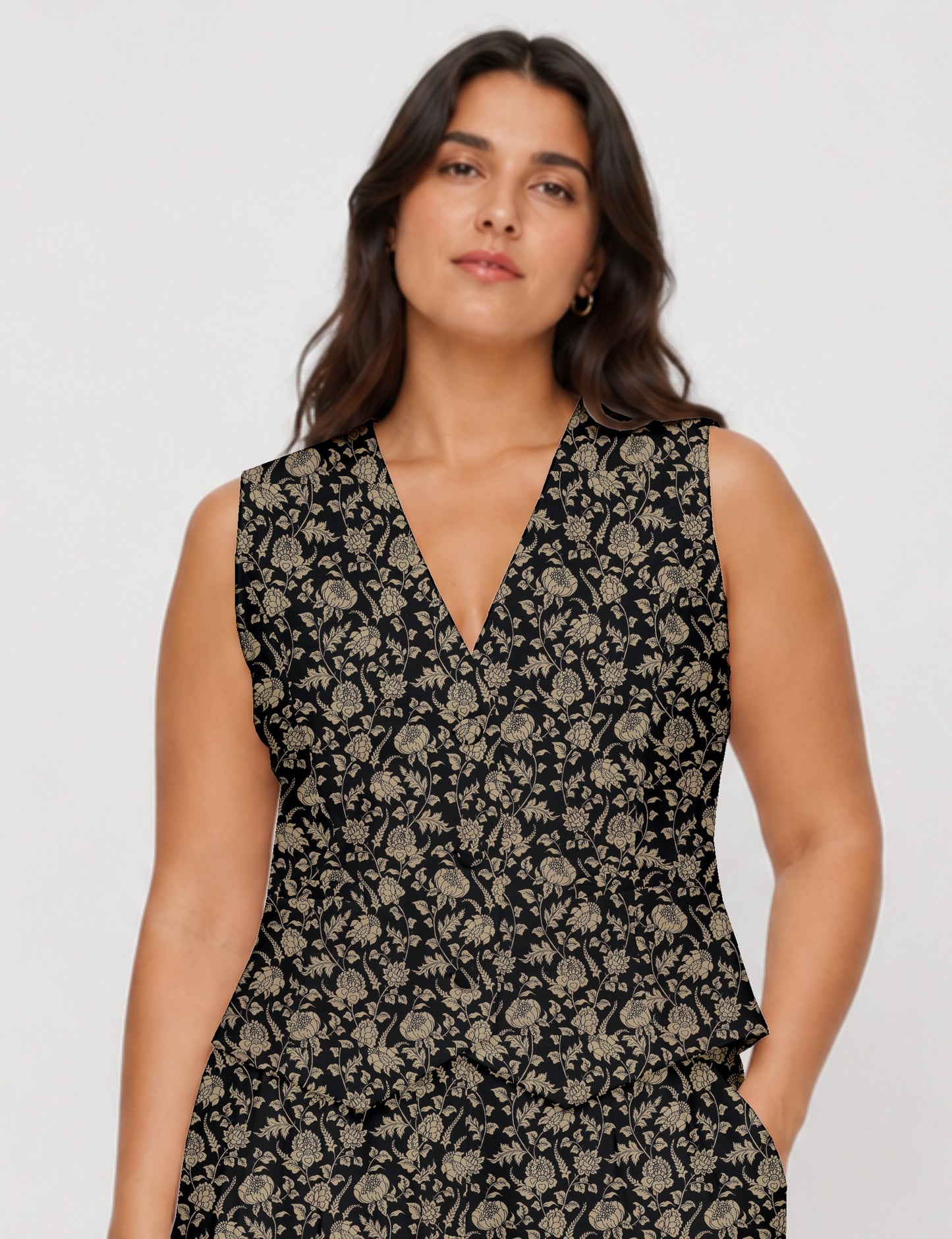 Women's fitted waistcoat with V-neck, single-breasted button closure, tailored silhouette, and pointed hem in sustainable fashion.