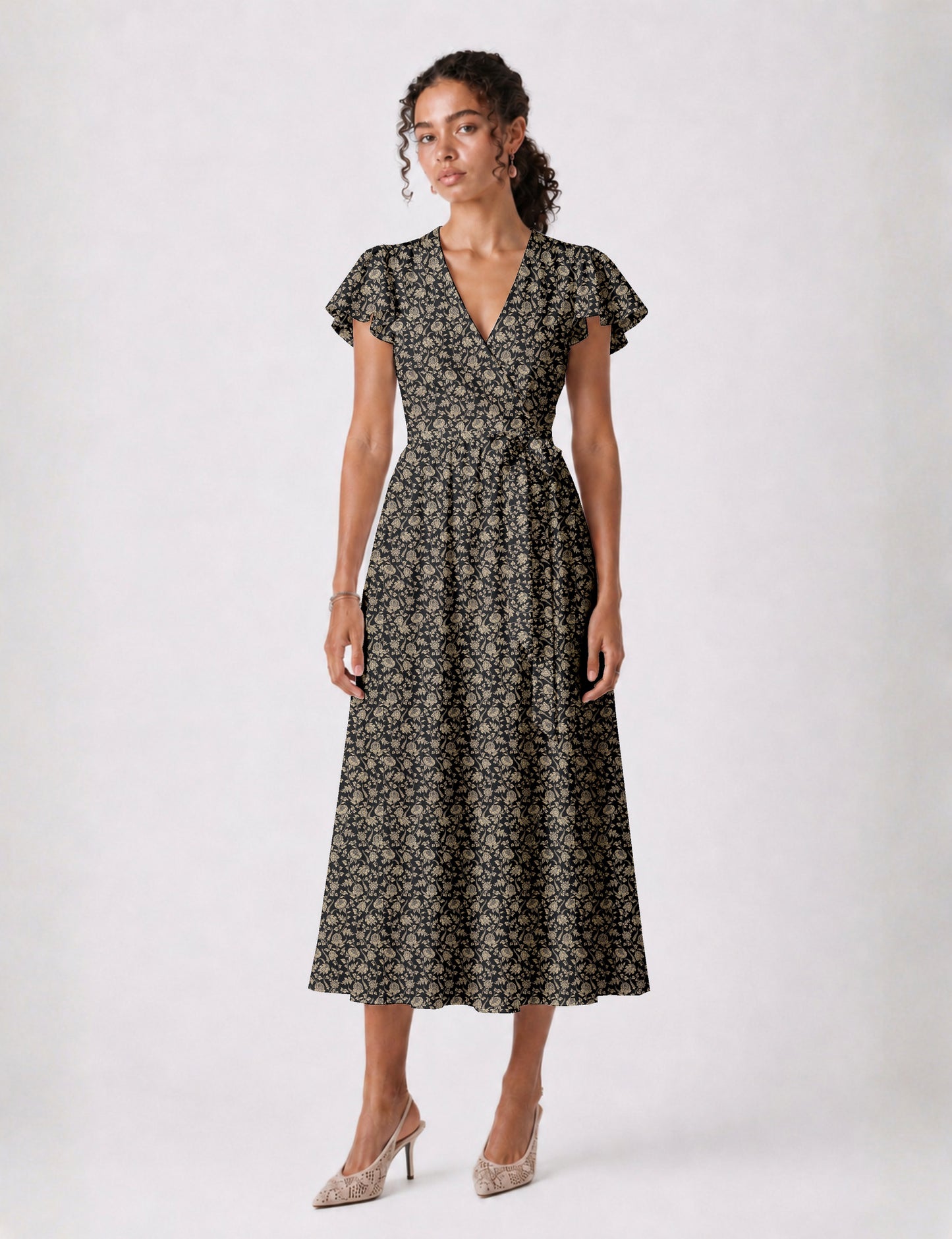 Elegant midi wrap dress with a V-neckline, adjustable waist tie, fitted bodice, and flared skirt for a timeless, flattering silhouette.