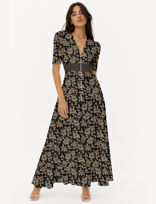 Maxi romantic dress with a fitted bodice, V-neckline, functional button placket, structured waist panel, short sleeves, and a softly flared ankle-length A-line skirt.