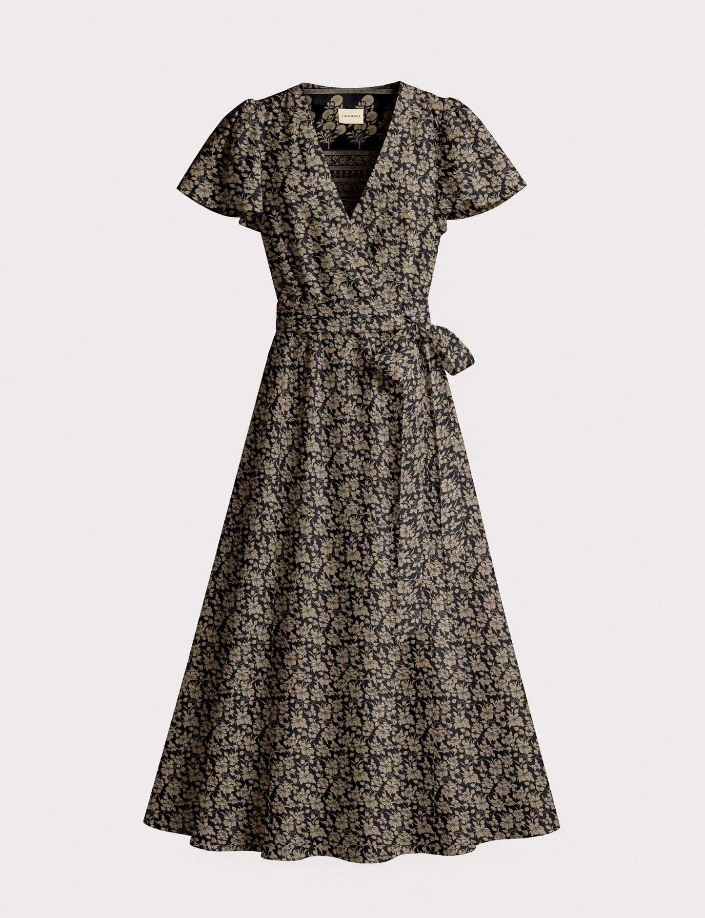 Elegant midi wrap dress with a V-neckline, adjustable waist tie, fitted bodice, and flared skirt for a timeless, flattering silhouette.