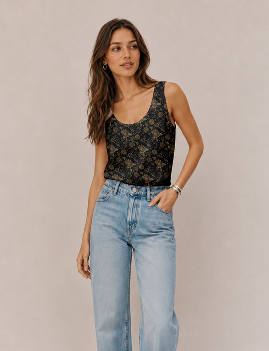 Women's sleeveless blouse with a relaxed straight fit, wide scoop neckline, deep scoop back, and hip-length silhouette.