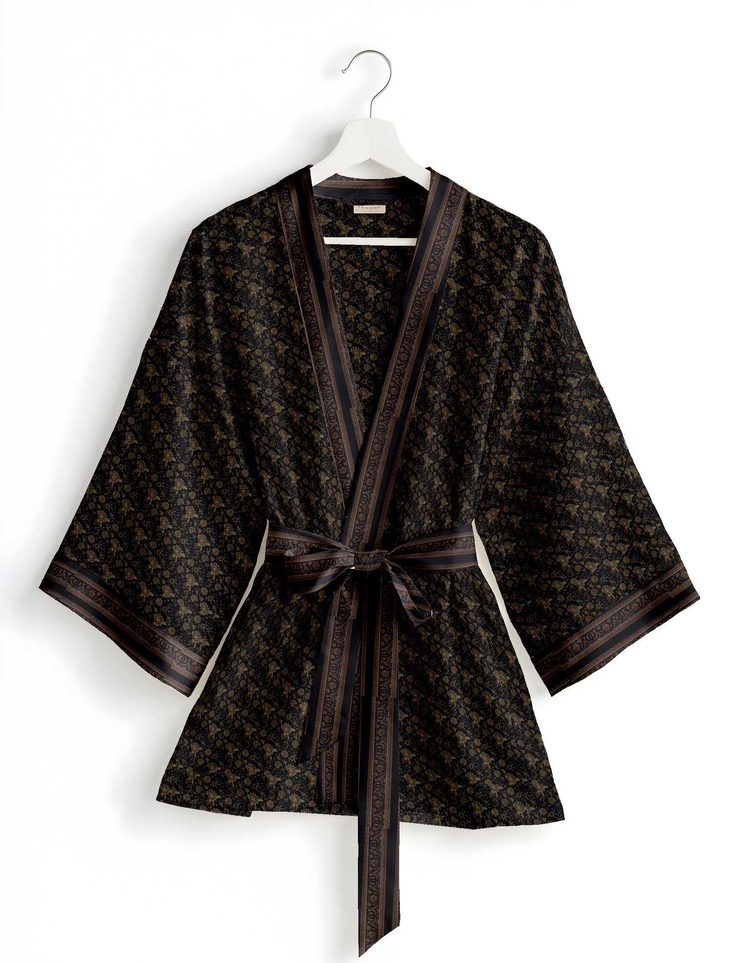 Short kimono robe with wrap front, V-neckline, wide sleeves, waist tie, and concealed skort detail.
